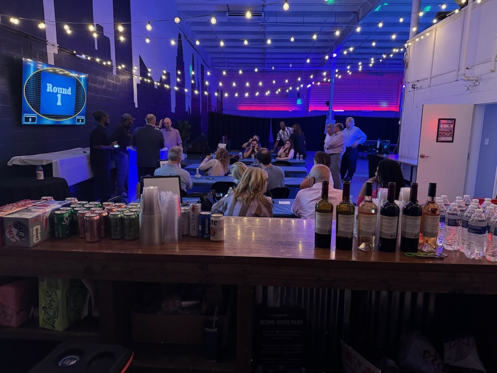 Indoor evening event with a prepared bar